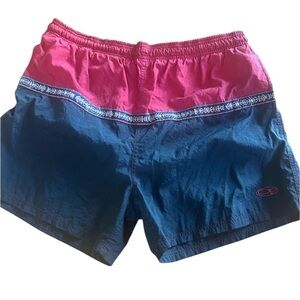 Ocean Pacific men’s swim trunks. Good condition. Large lined Red Black and Navy.